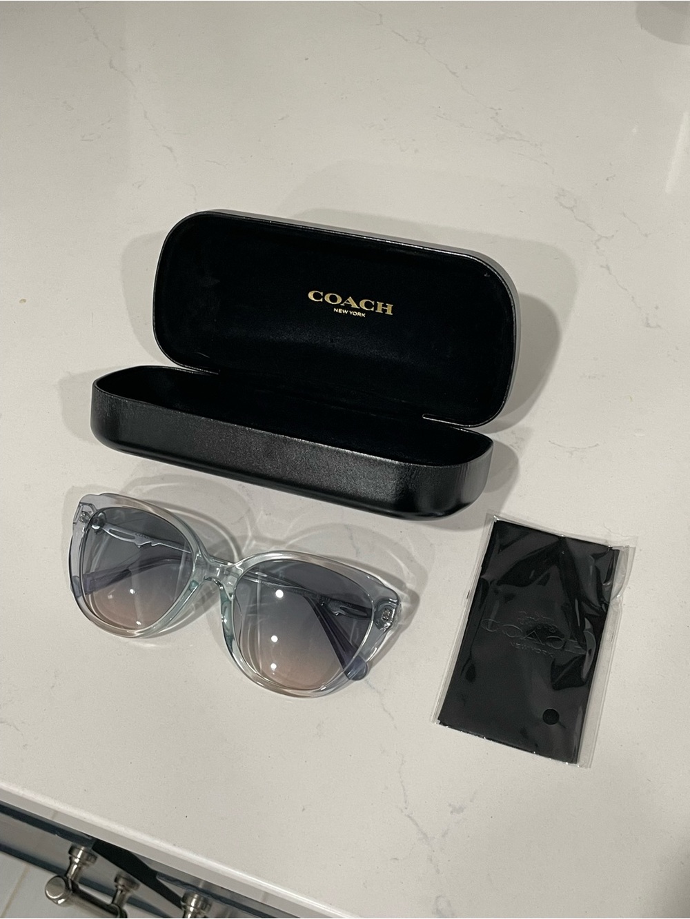 COACH Clear Frame Sunglasses with Blue-Gray Gradient Lenses